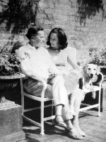With his wife and their dog